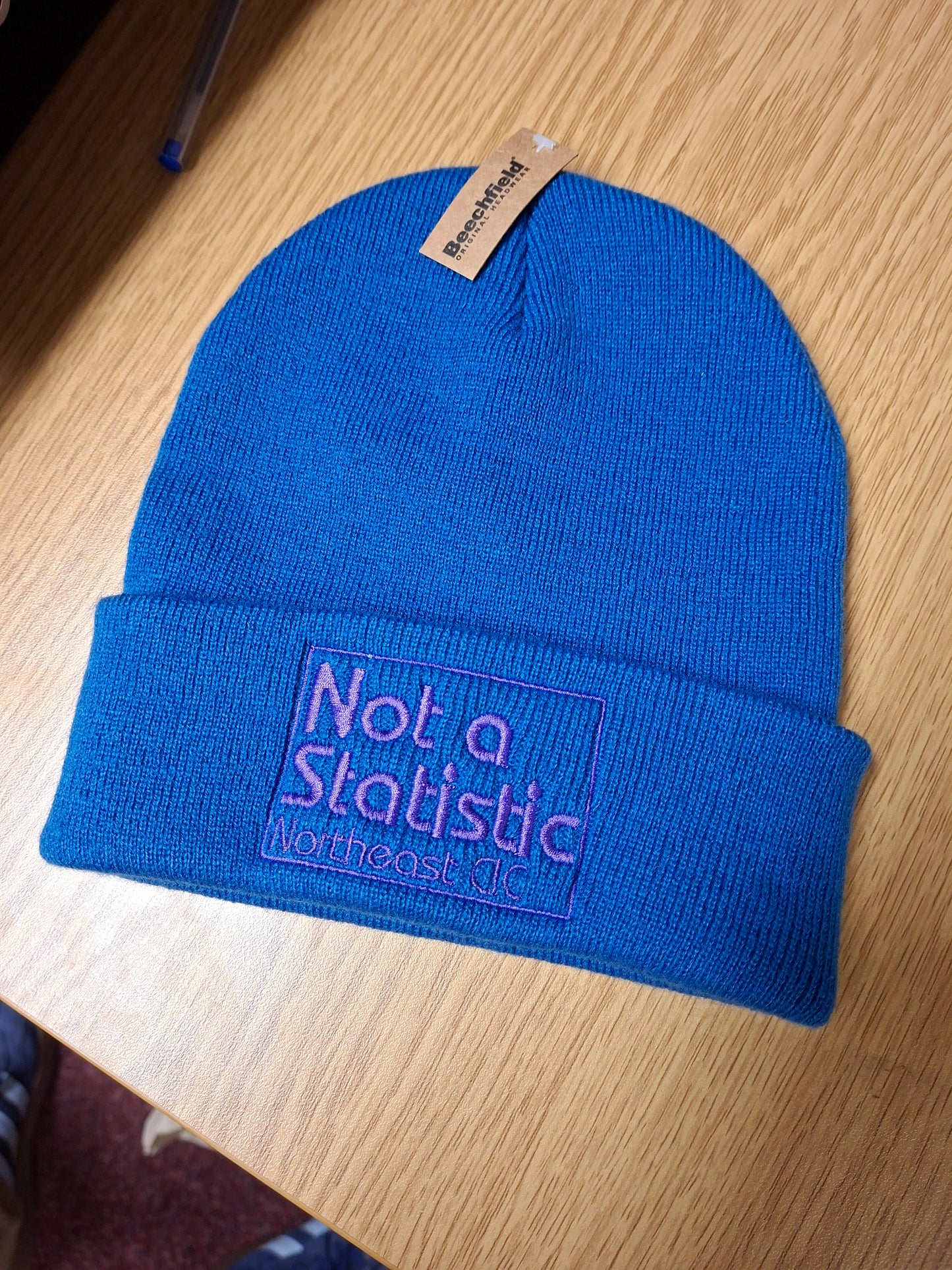 Not A Statistic NE Beanie Hats